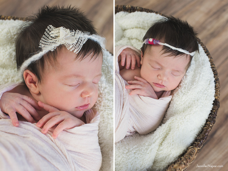 Newborn baby girl in a basket