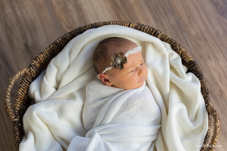 Newborn baby in a basket