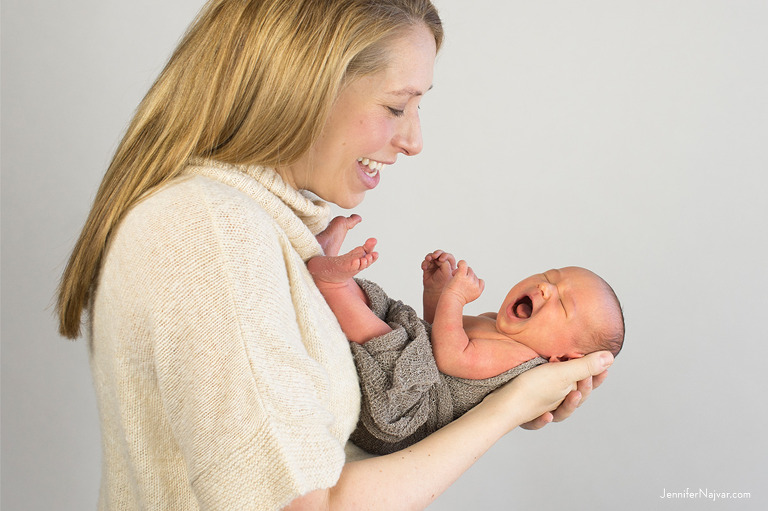 Studio portrait newborn with mother