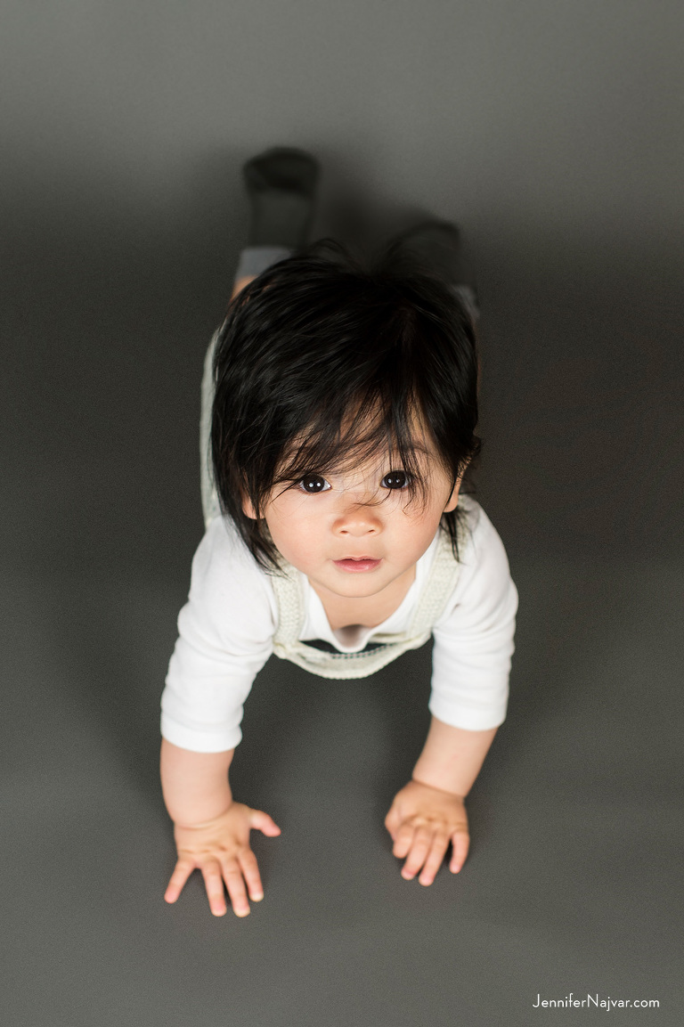 Crawling Baby Looking up at Camera