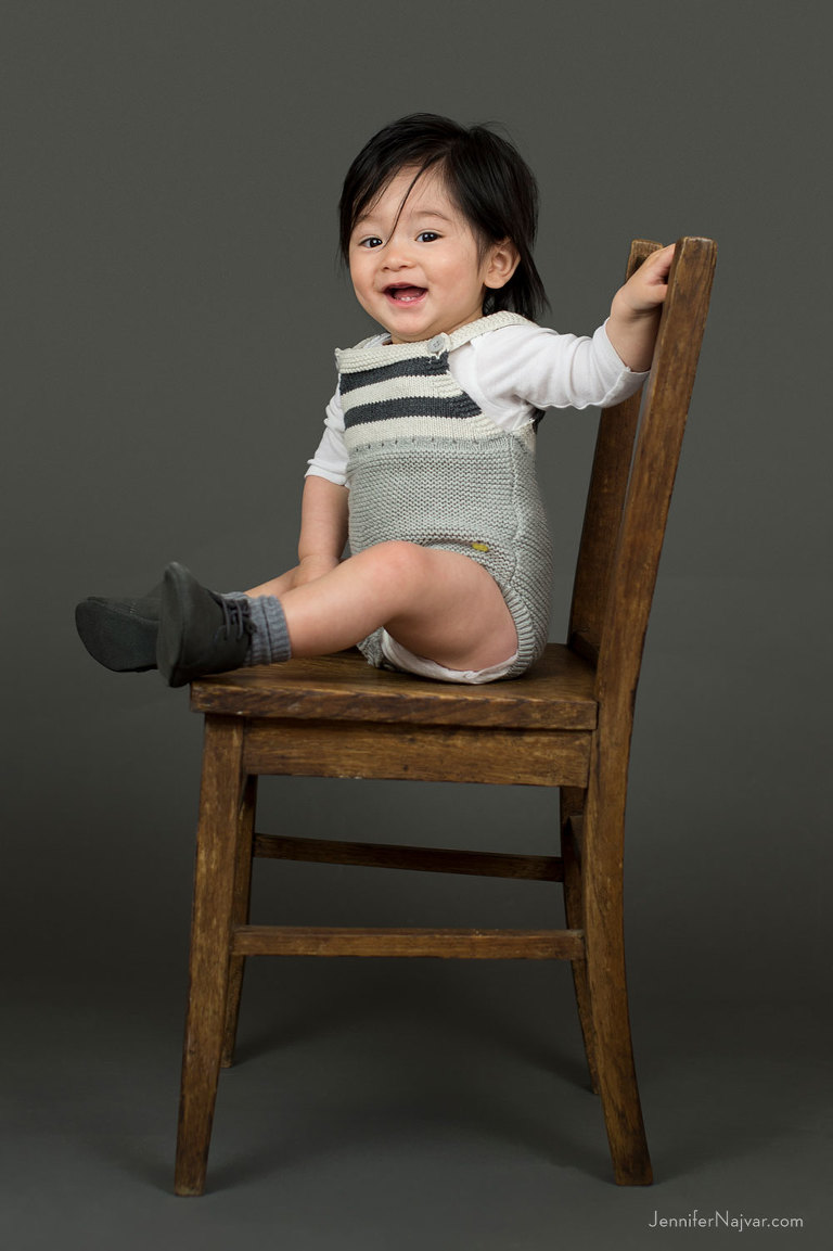 Baby Boy Sitting in a Wooden Chair