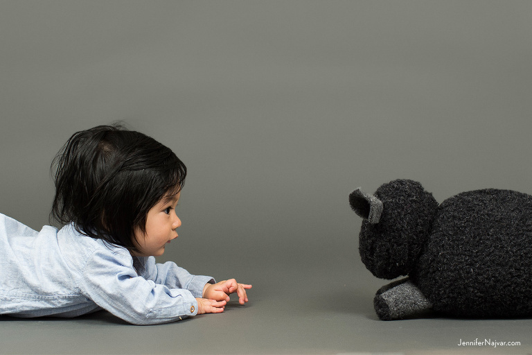 Unique Photo of Baby Boy Face to Face with a Stuffed Animal