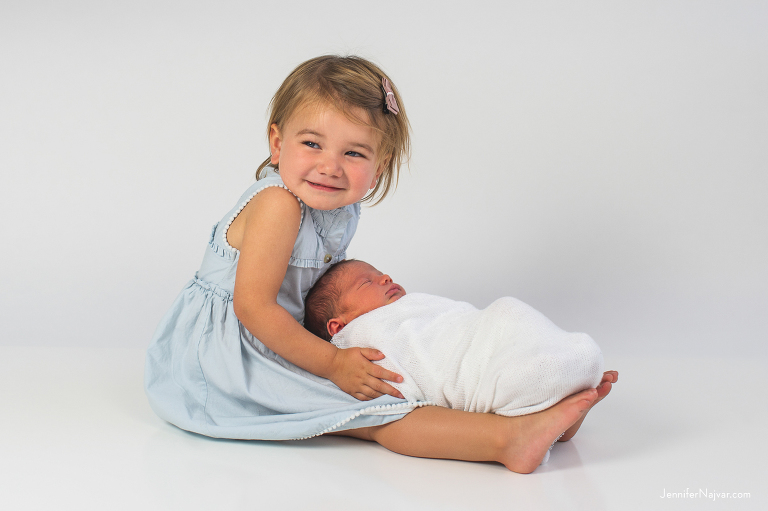 mom dad and newborn photography