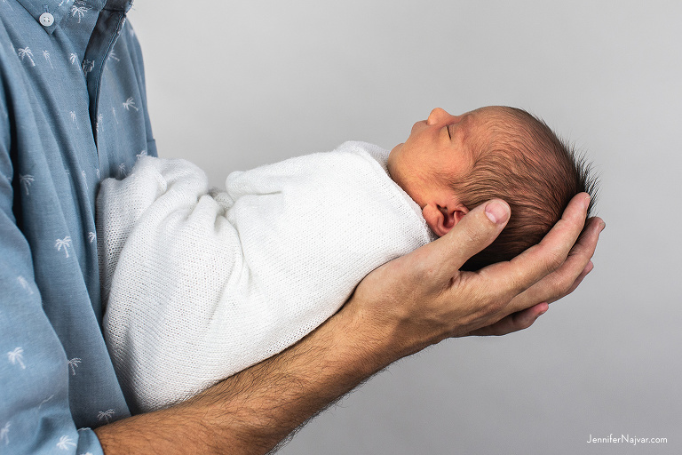 Baby Girl in Dad's Hands